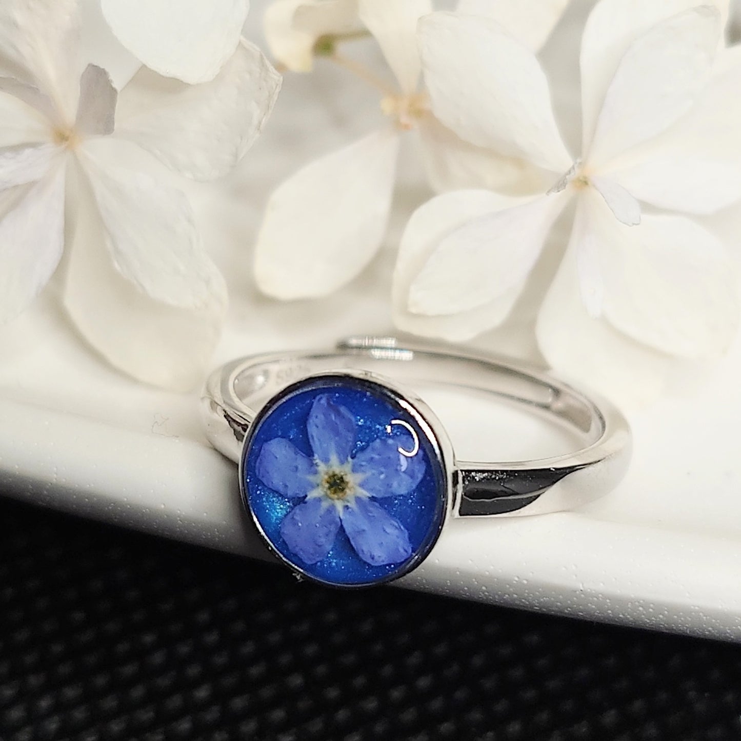 Forglemmegei justerbar ring