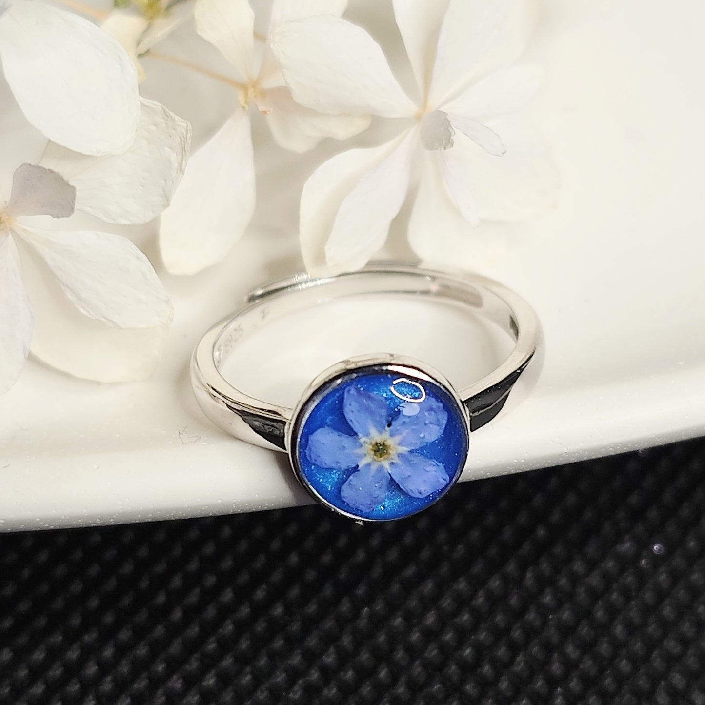 Forglemmegei justerbar ring